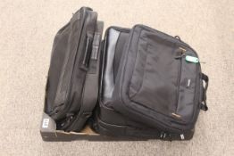 A box containing a quantity of laptop carry bags.  SUBJECT TO VAT