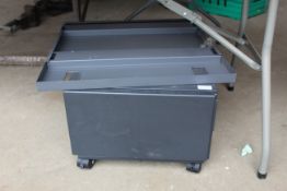 Small metal cabinet on wheeled base SUBJECT TO VAT
