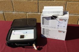 Mortara ELI230 electrocardiograph in hard carry case with 2x boxes containing a quantity of SKINTACT