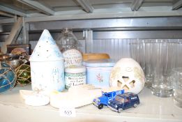 A wooden bowl; a Laura Ashley tin; and various oth