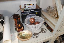 A model wooden train; an Abalone shell; a horses b