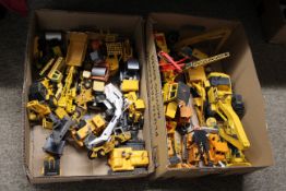 A collection of various unboxed excavators, diggers, forklifts, cranes, trucks etc. various makers