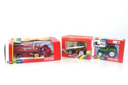 Britains Massey Ferguson 760 combine No.9570; a Britains Deutz DX 4.57 tractor No.9496; and Britains