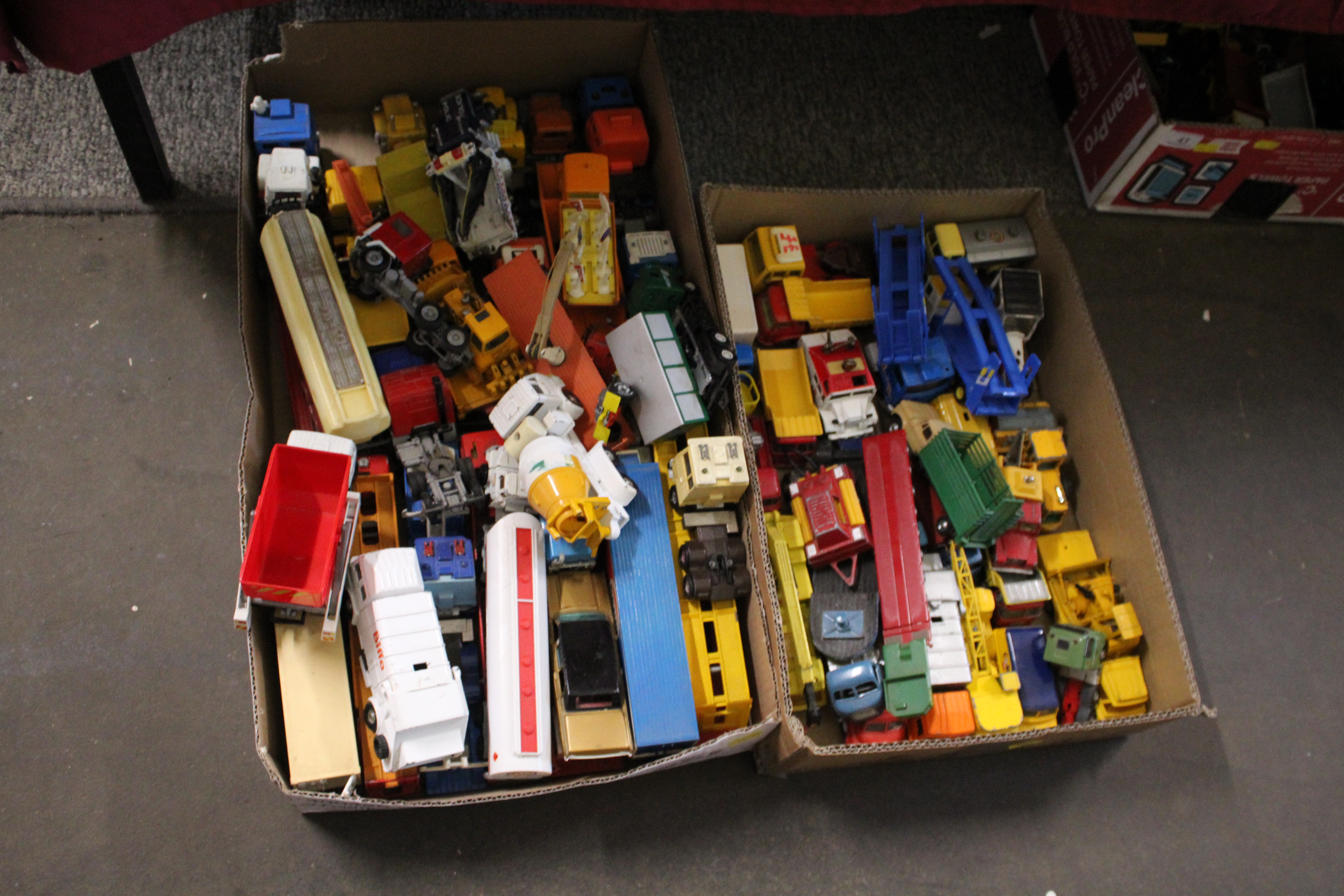A large collection of various unboxed die-cast model vehicles to include car transporters, petrol