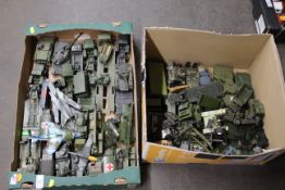 A large collection of unboxed Dinky and others military vehicles including tanks and transporters,