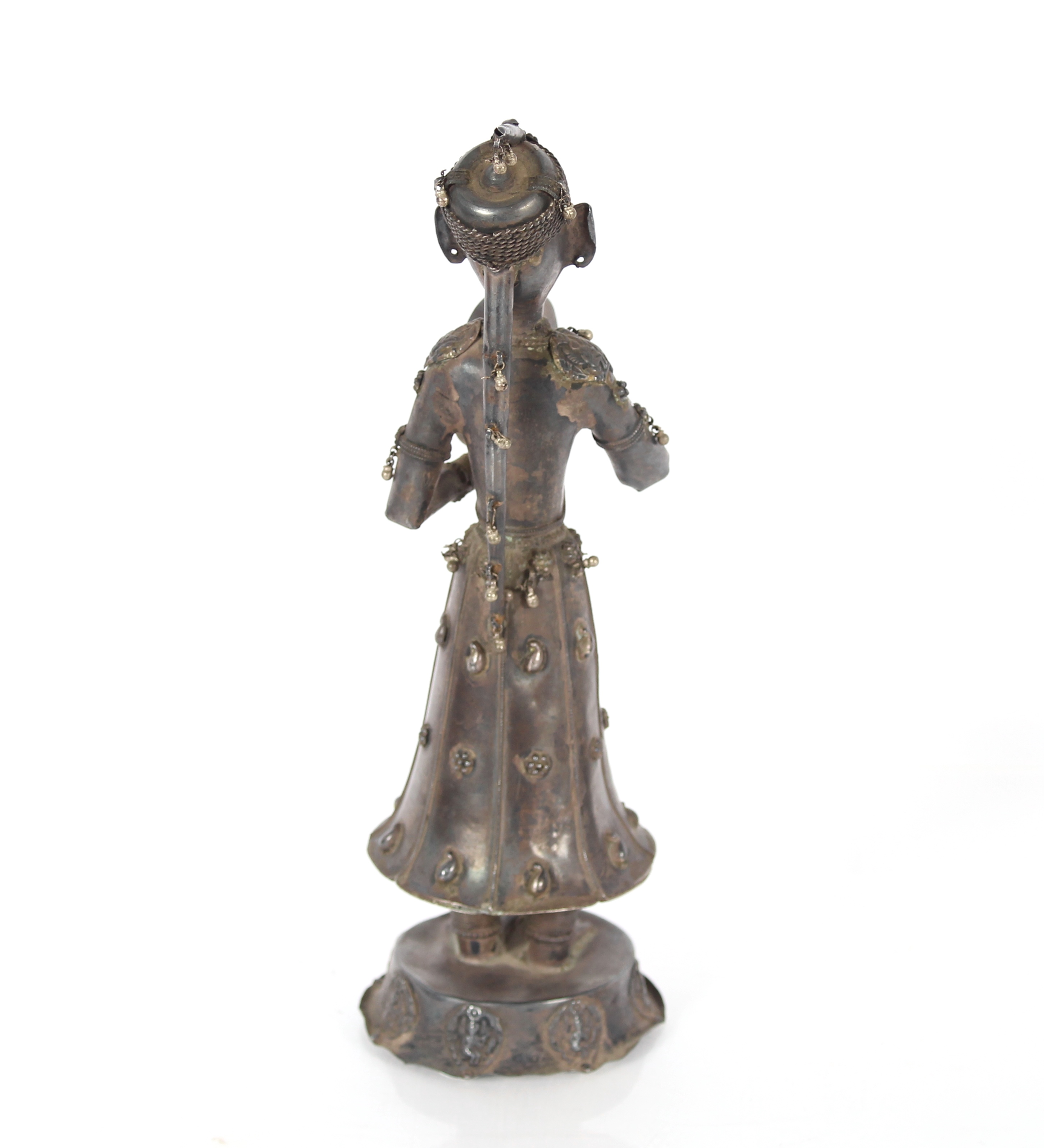 A 19th Century Indian silver figure of a musician, 30cm high - Image 3 of 4