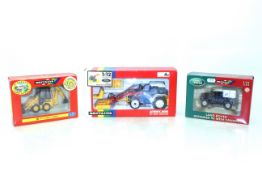 A Britains JCB 1CX Skid Steer No.09453; Britains Land Rover Defender 90 with canopy No.42101 and