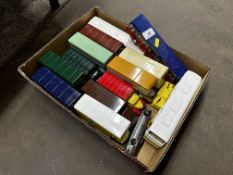 A collection of various unboxed coaches and lorries, play worn