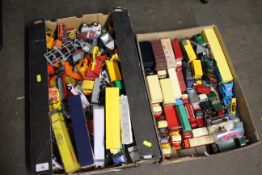 A collection of various die-cast vehicles including Budgie Toys, Scammell Scarabs, and many others