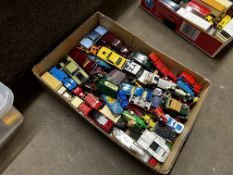A large collection of unboxed model cars, mostly play worn