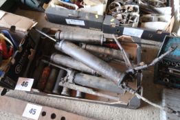 Quantity of grease and oil guns. SUBJECT TO VAT
