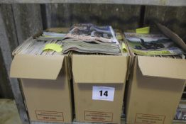 Three boxes of Old Glory magazines.