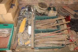 Pallet containing Bed tiller gear box, prop shaft, lay flat hose clamps, bars etc.