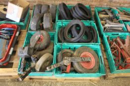 Pallet with castor wheels, press wheels and unused