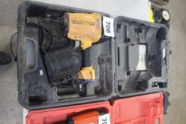Large Bostitch air nailer.