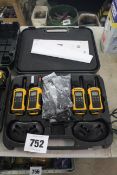 Set of four Motorola radios in case. With chargers