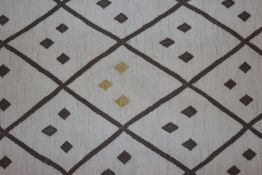An approx. 6' x 4' Weaver Green Mdina Safi rug