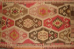 An approx. 5' x 3' Nomad Sultan rug