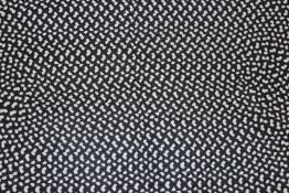 An approx. 6' x 4' Eco Braid Soot oval rug