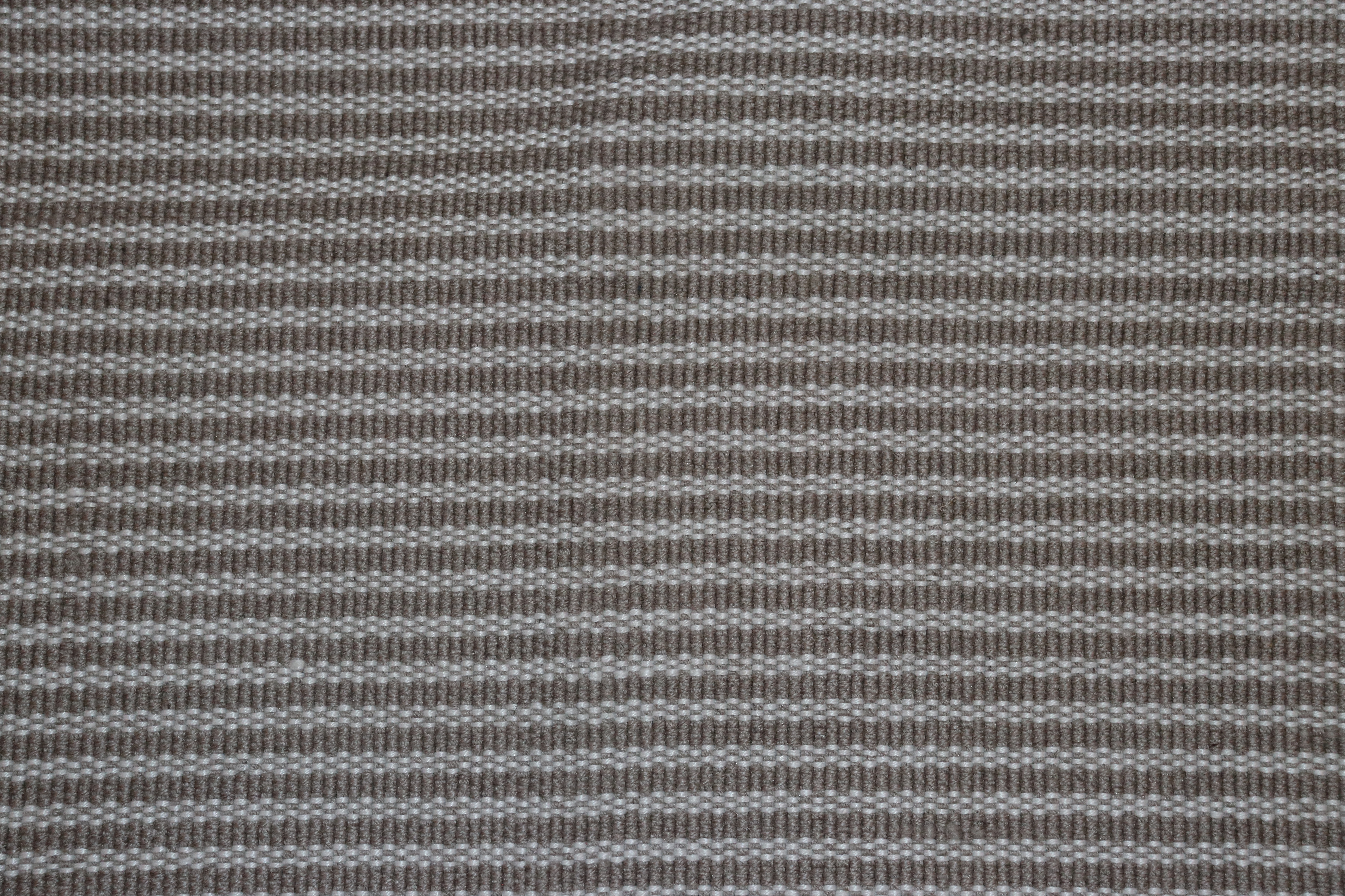 An approx. 6' x 4' Polperro Chinchilla Weaver Gree