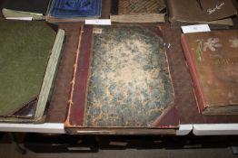 An album containing various 19th Century black and white book plates of various European scenes,