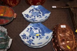 A set of four Japanese blue and white fan shaped d