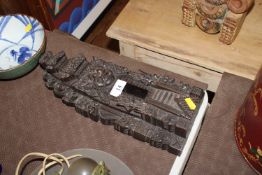 An Indonesian carved figure
