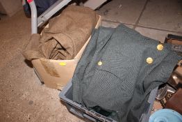 Two boxes of military uniforms