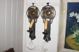 A pair of metal Arts & Crafts wall lights