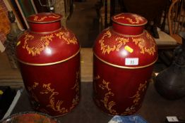 A pair of Chinoiserie decorated tea canisters