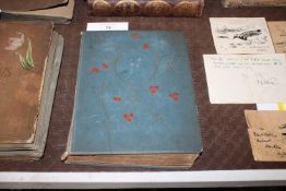 An early 20th Century postcard album containing va