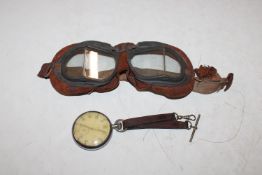 A Cyma military marked pocket watch and a pair of