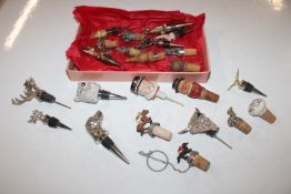 A box containing various novelty and other bottle