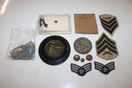 A box of mixed military items including miniature