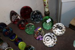 A collection of nine various coloured and clear gl