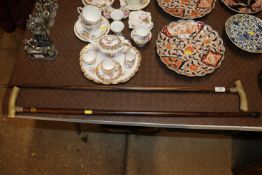 Two horn handled walking sticks with sterling silv