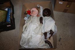 A vintage porcelain headed doll and papier mache s