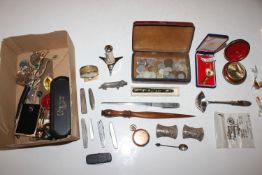 A box of interesting items to include a leather bo