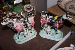 A pair of 19th Century spongeware cow creamer and