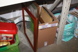 A wall mirror and various other prints