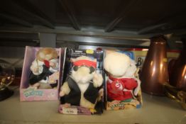 A collection of dancing hamster toys