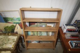A stripped pine wall shelf