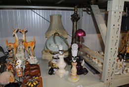 A Corinthian column table lamp and four other tabl