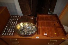 A display rack of thimbles and two display racks a