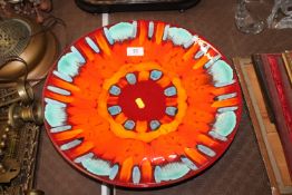A Poole Pottery charger 'Volcano' approx. 40cm dia