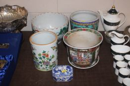 Four Oriental jardinieres and a blue & white Moyse