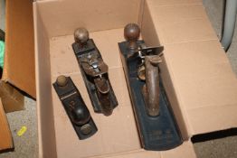 A collection of carpentry planes including smoothi