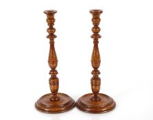 A pair of golden oak bespoke candlesticks by Titch