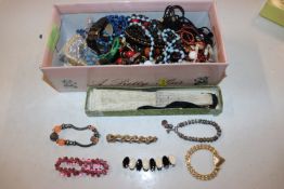 A box of various miscellaneous costume jewellery