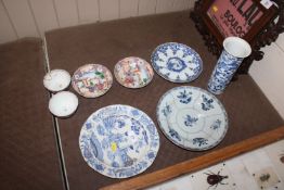 An antique Chinese blue and white cylindrical vase